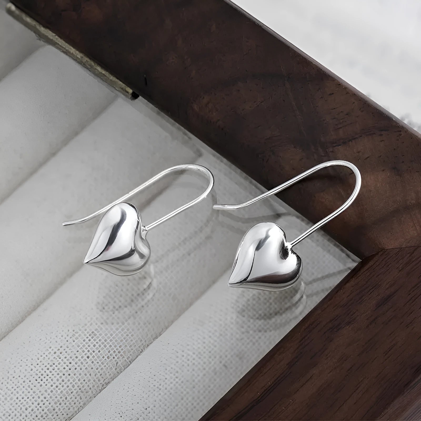 Korean style glossy heart-shaped copper earrings with silver finish for women