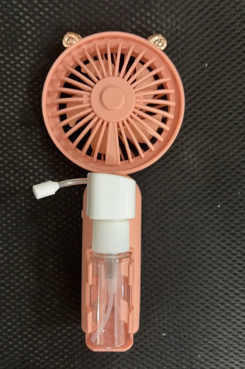 Colourful plastic handheld personal fan with nozzle, shown with USB charging cable