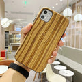 Wooden mobile phone case for iPhone showing natural bamboo grain and rosewood finishes