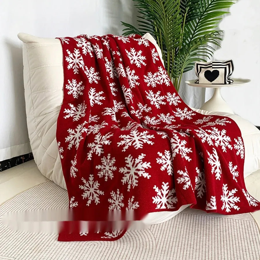 Christmas blanket with reindeer or snowflake pattern in acrylic fabric