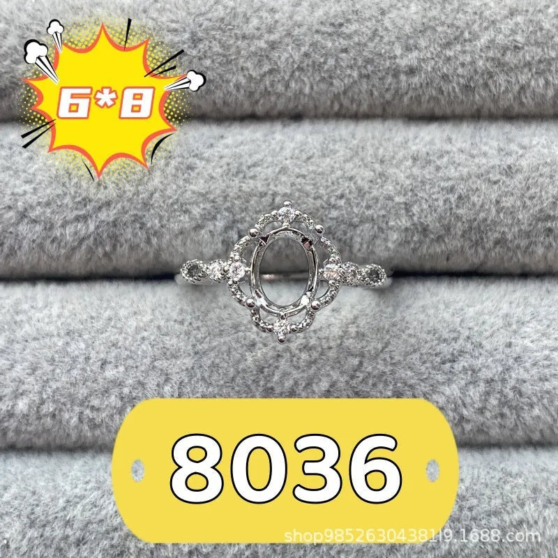 Copper oval denier ring with a 6x8 mm stone and a five-pointed star design.