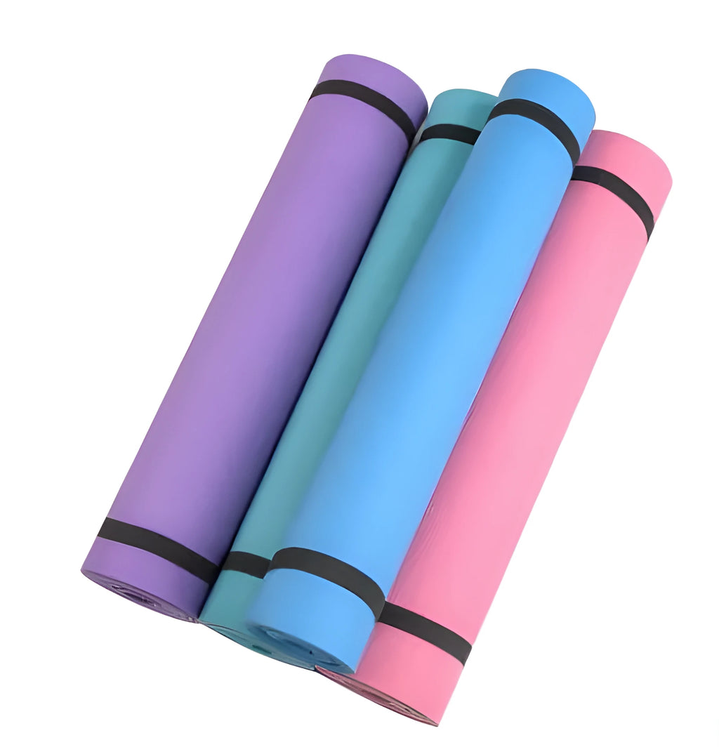 EVA foam yoga mat in blue, showing textured anti-slip surface, with a black OPP storage bag beside it.