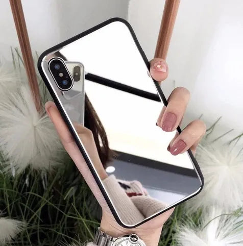 Black iPhone mirror phone case showing reflective back surface, compatible with multiple iPhone models.