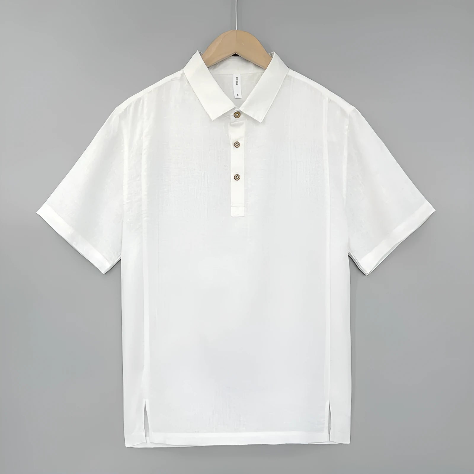Men's loose-fit linen short-sleeve top in grey green on a hanger.