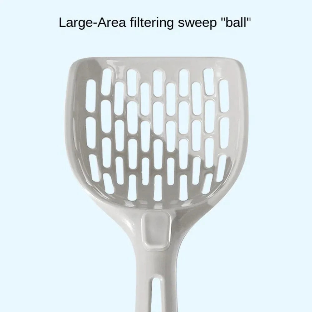 Grey plastic cat litter scoop with integrated base on a white background