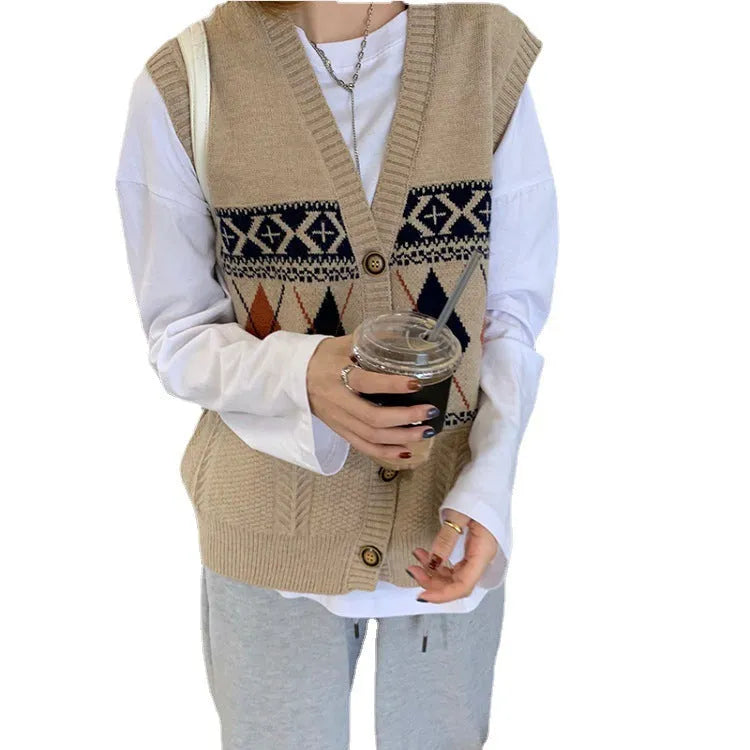 Woman wearing a khaki sleeveless cardigan with a diamond plaid pattern, loose fit.