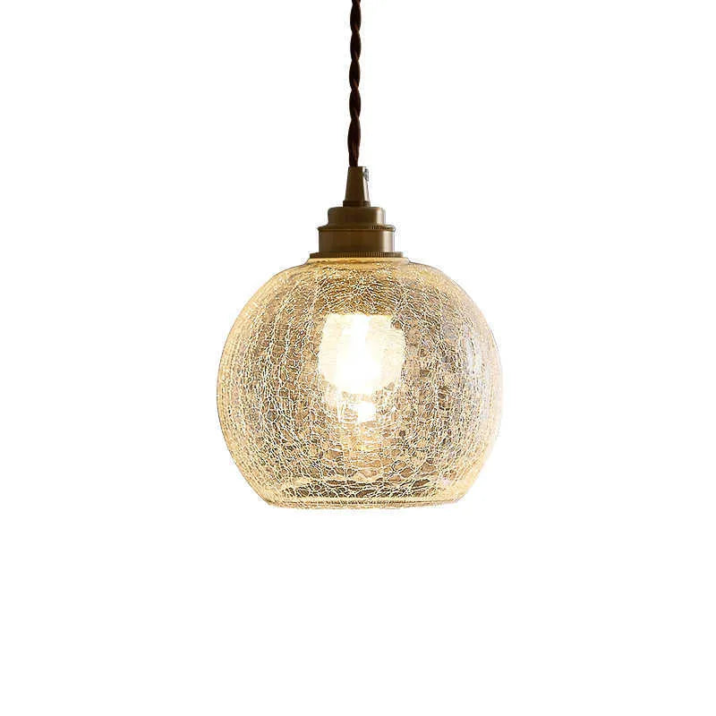 Retro-style brass and glass ball chandelier ceiling light with copper body and spherical shades.