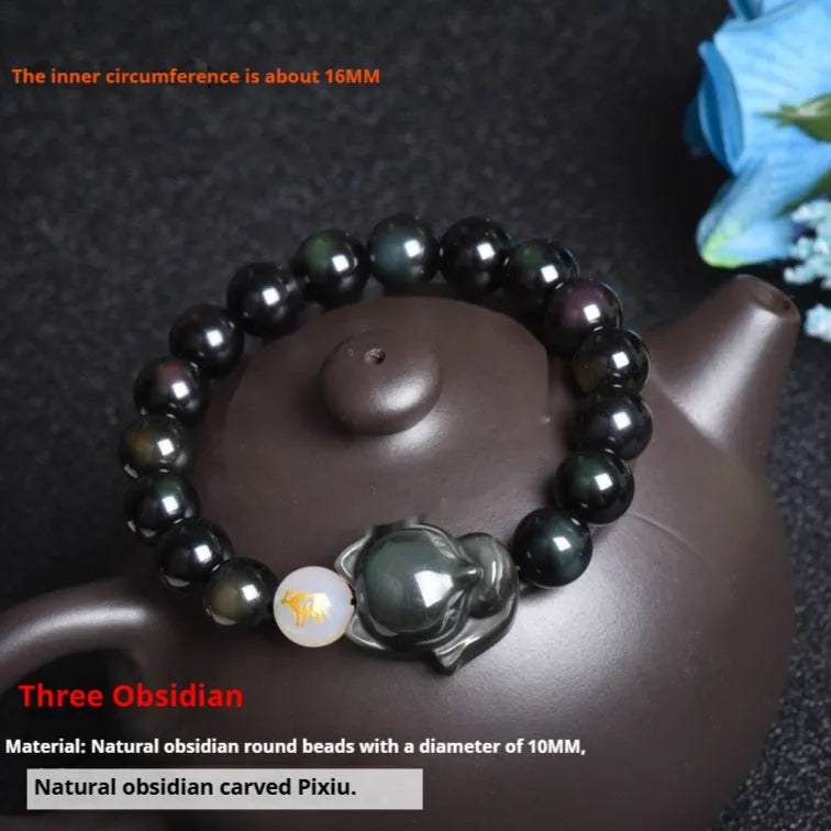 Natural obsidian zodiac guardian bracelet with 10mm beads on an adjustable cord.