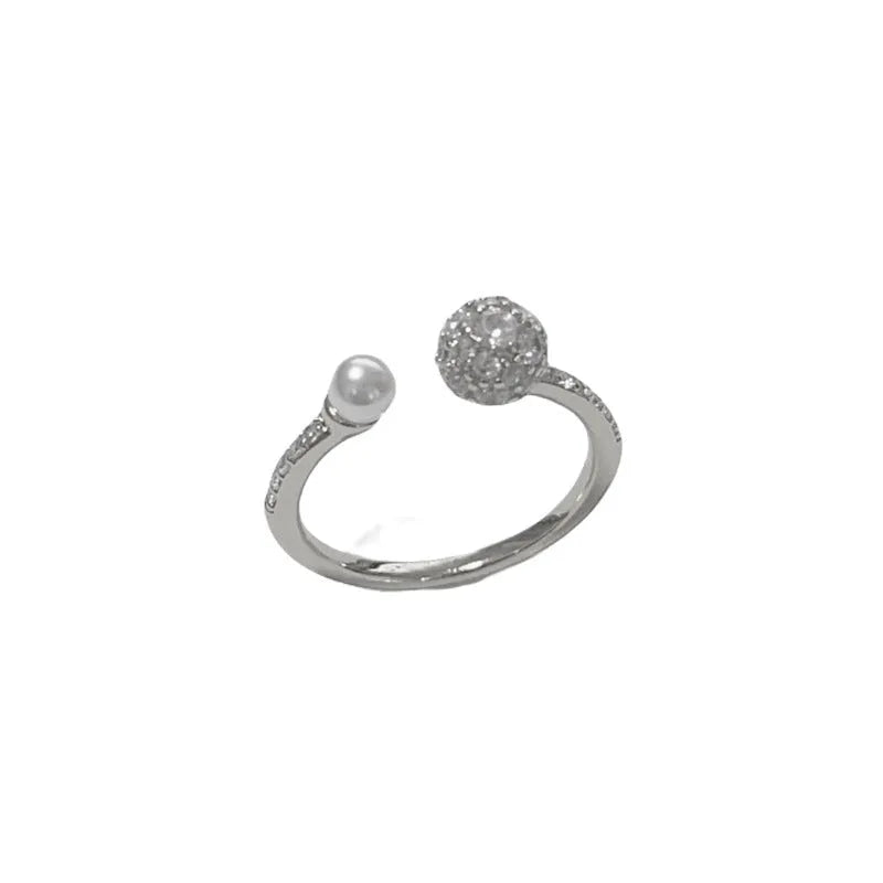Geometric open-end ring with round zircon accents in gold or silver finish
