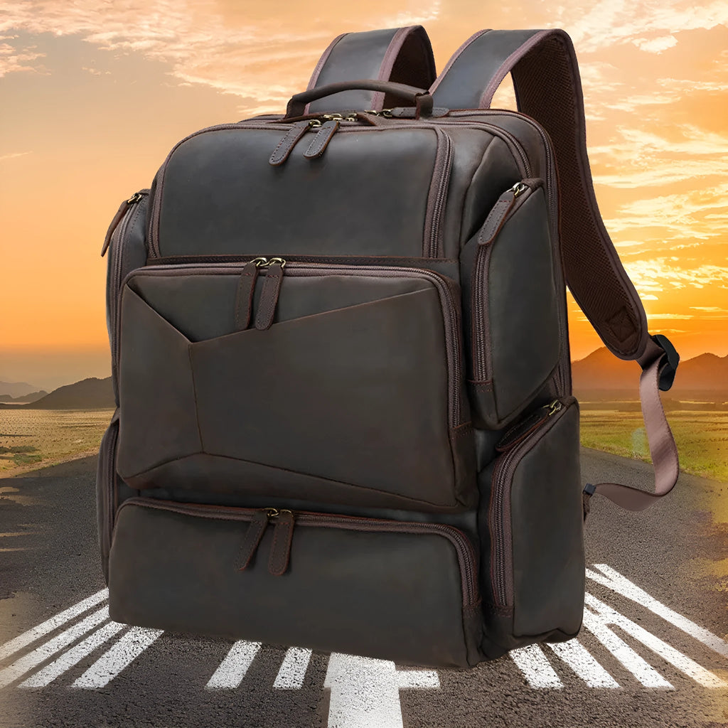 Dark brown genuine leather backpack with 17-inch laptop compartment and double shoulder straps