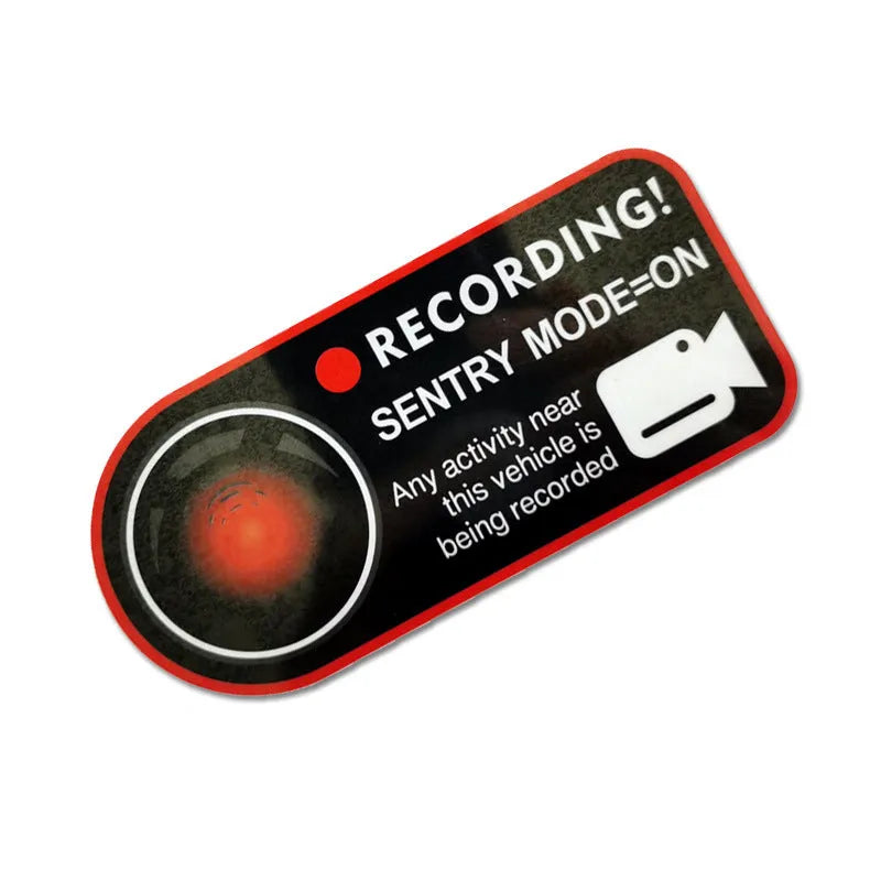 Two white electrostatic warning stickers for Tesla Sentry Mode, each measuring 11 by 5 centimetres.