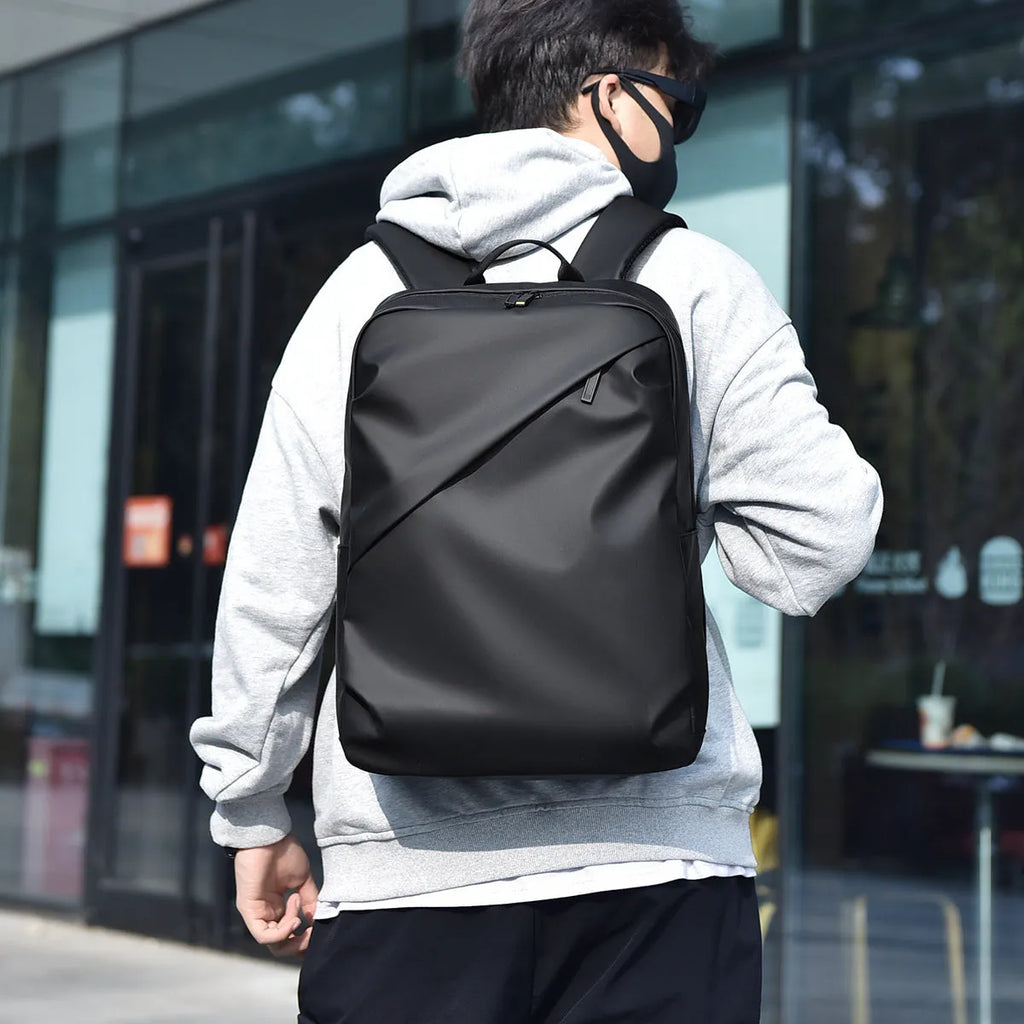 Large black waterproof PU leather backpack with sewing thread detailing