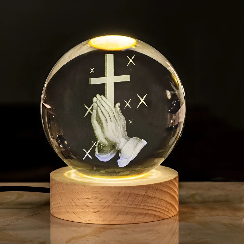 6cm white crystal religious ornament on wooden base with warm lighting