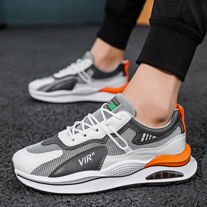 Men's grey and black mesh casual running shoes with a lightning graphic and round toe.