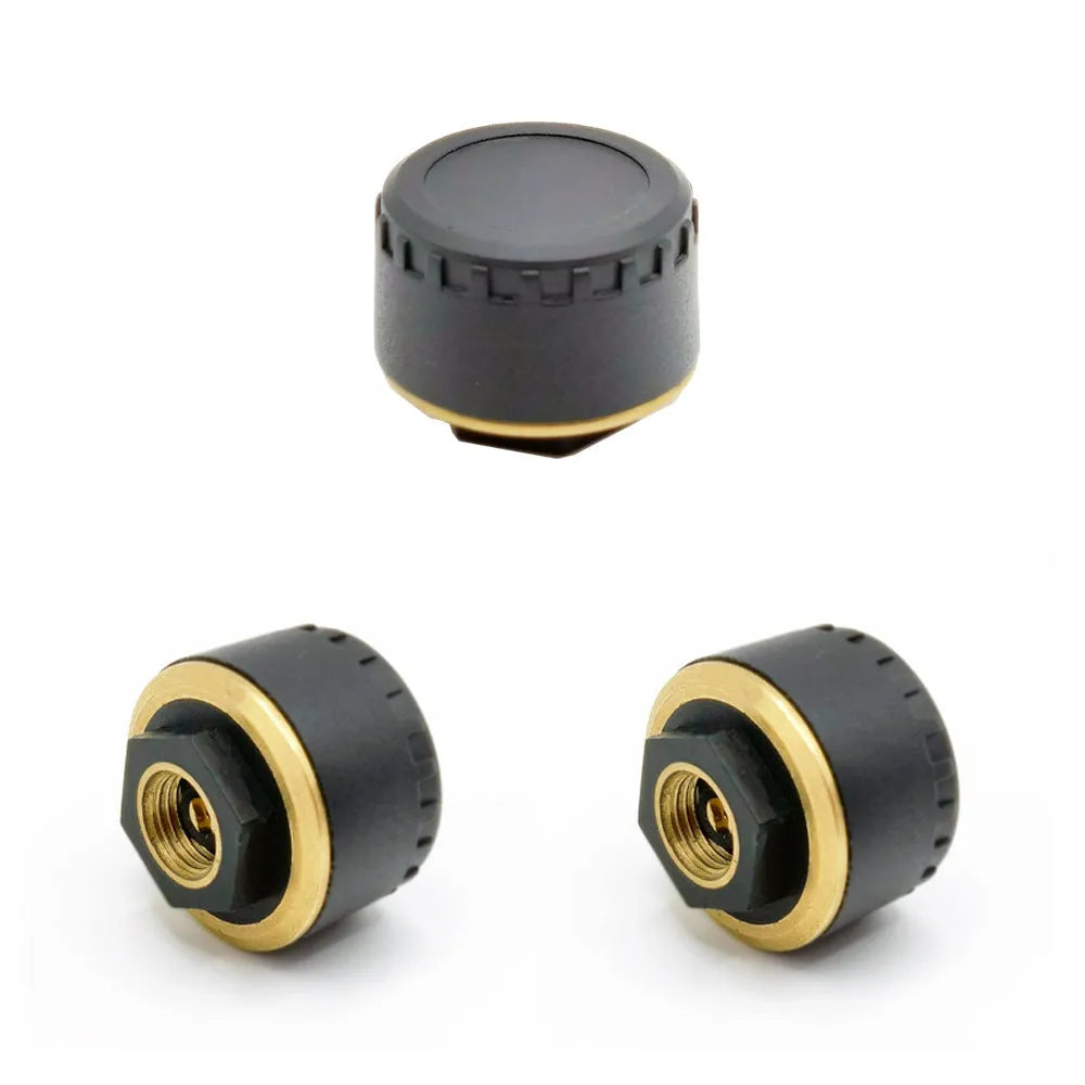 Four black Bluetooth tyre pressure sensor caps for car with mobile phone display