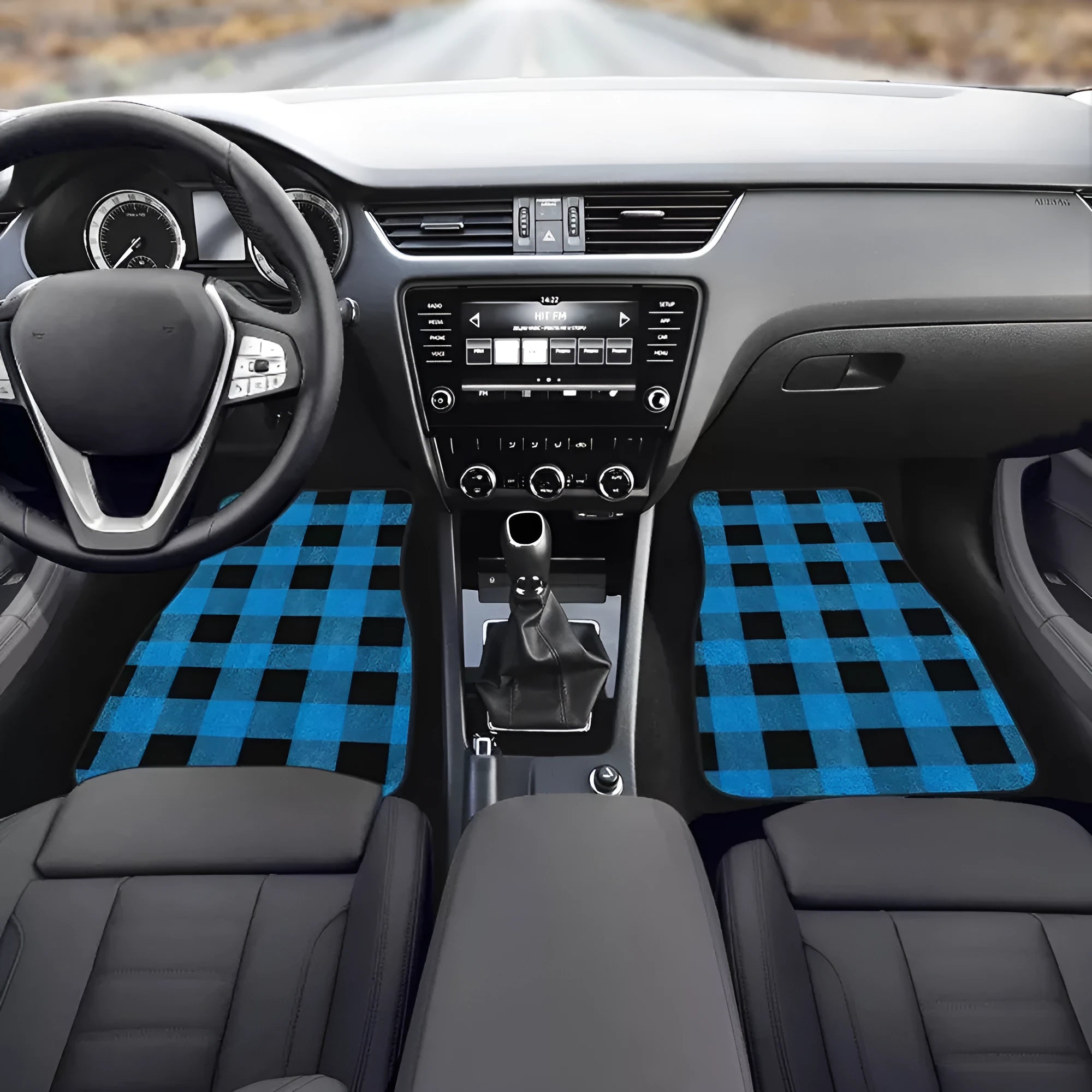 Black printed rubber car floor mat set showing four pieces with textured surface.