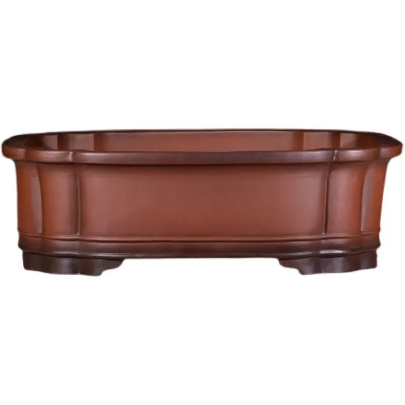 Large rectangular purple clay flowerpot with antique jade finish and Chinese crabapple carvings