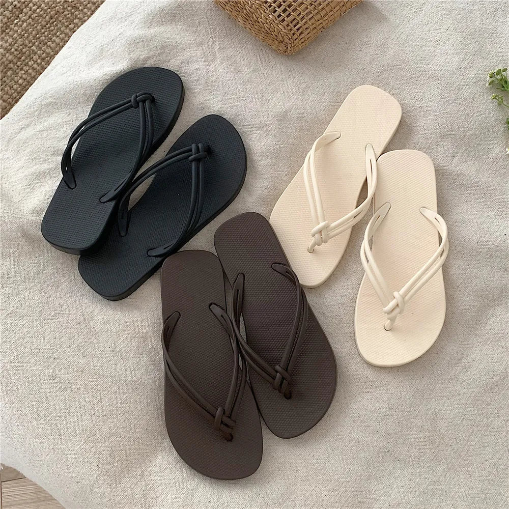 Men's casual PVC flip flops in beige with toe-covering style and injection moulded sole.