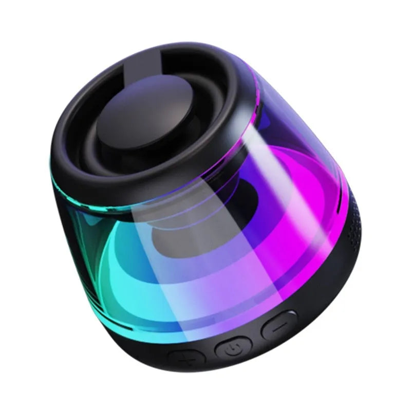 Portable wireless Bluetooth speaker with ambient lighting and magnetic base in black or white