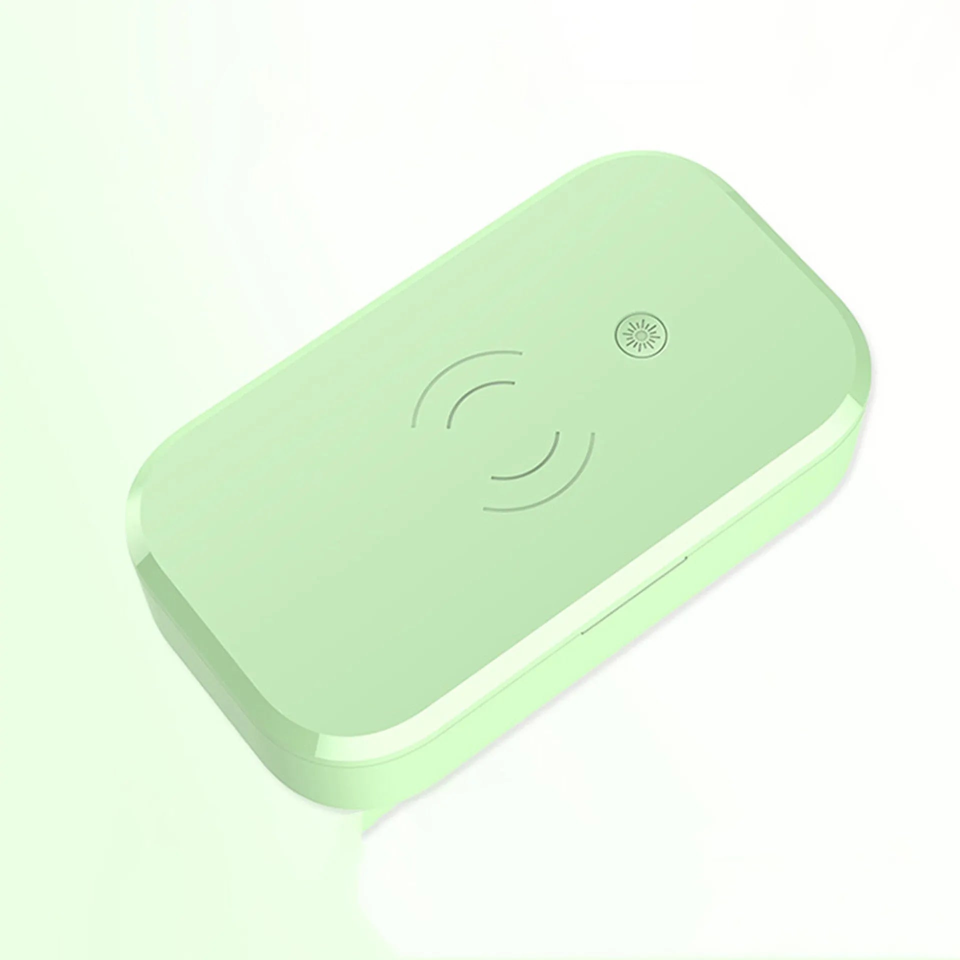 A white ultraviolet disinfection box with wireless phone charging pad on top, for nail art tools.
