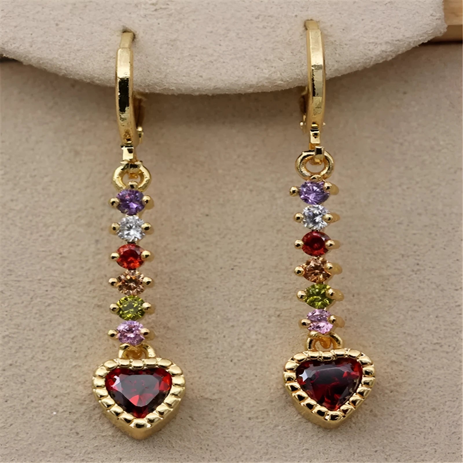 Women's heart-shaped fashion earrings in gold or silver colour with electroplated alloy construction