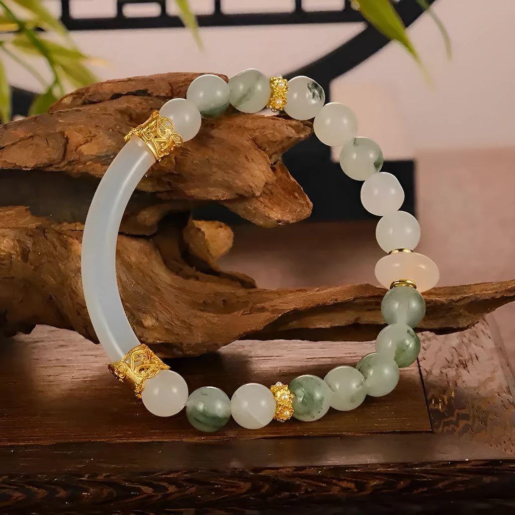 Emerald green Tian Shan Cui jade bracelet with floating flower girl half design and round elements