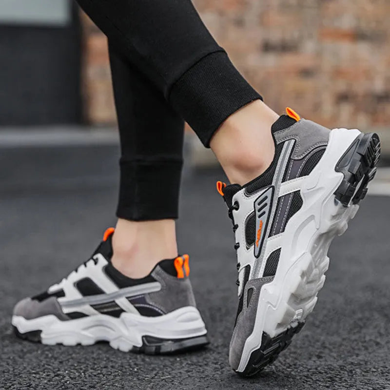 Black and white men's lace-up mesh sneakers with thick rubber sole for outdoor running