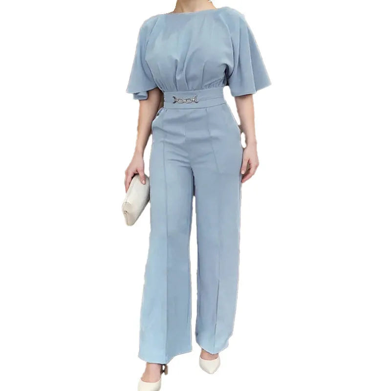 Blue men's polyester casual suit set with long sleeves and trousers on a hanger.
