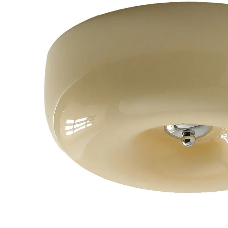 Cream coloured American style bedroom ceiling lamp with a modern vintage design shown in a bedroom setting.