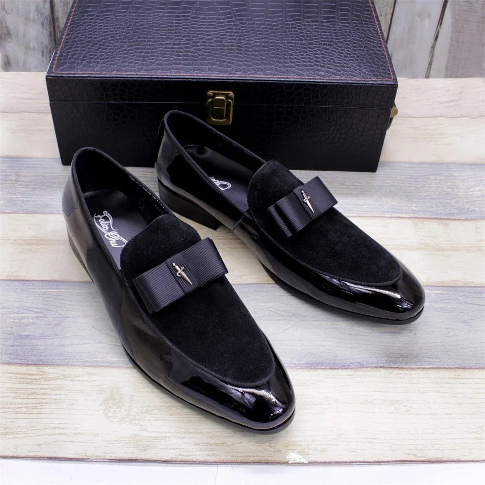 Men's glossy patent leather low-top shoes with a tassel in black, shown from a side view.
