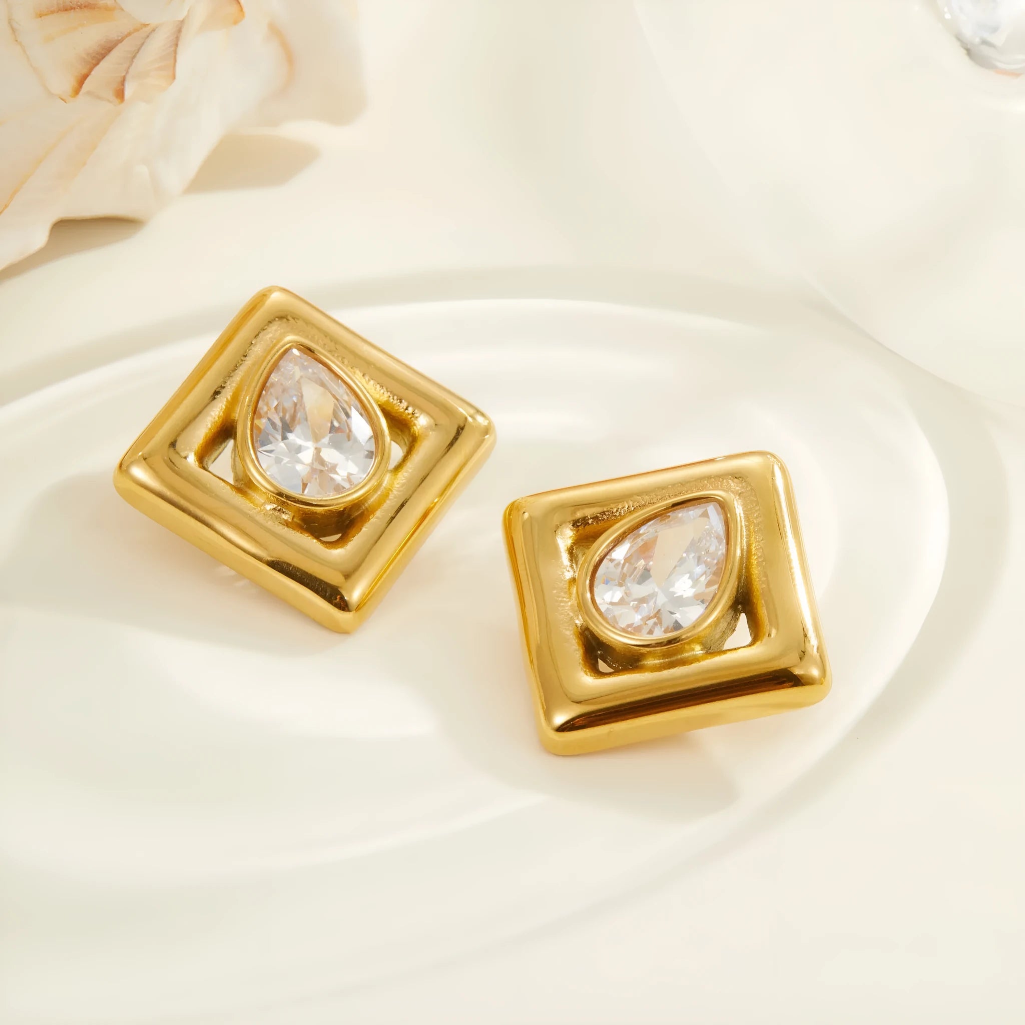 Geometric gold stud earrings with water drop zircon stones on stainless steel