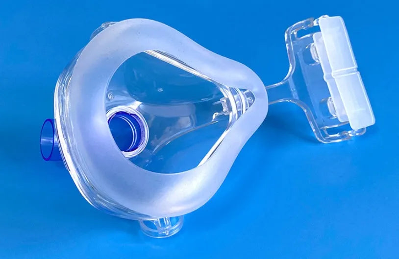 Transparent CPAP breathing mask with medical silicone seal and dual rotary elbows for ventilator connection