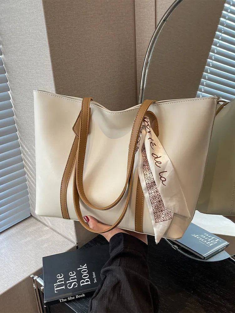 Women's large-capacity soft bucket shoulder bag in multiple colour options with zipper pocket