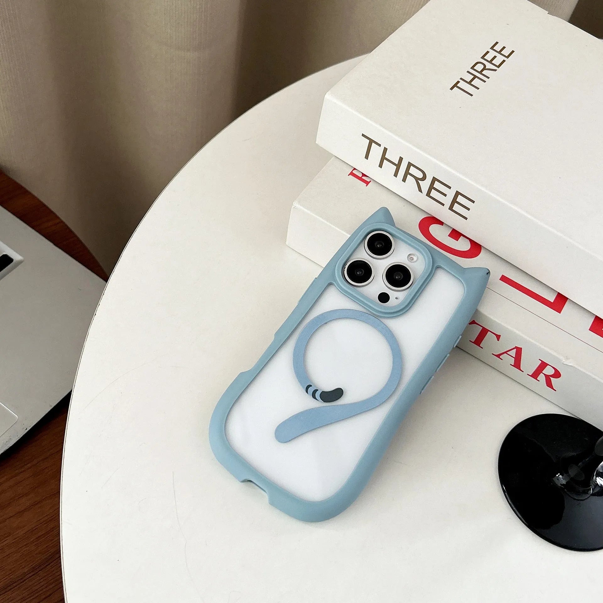 Transparent acrylic TPU iPhone 17 phone case showing magnetic suction and shockproof protection features