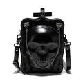 Black mini skull shoulder bag with 3D embossed design, chain strap, and vertical square shape for Gothic fashion.