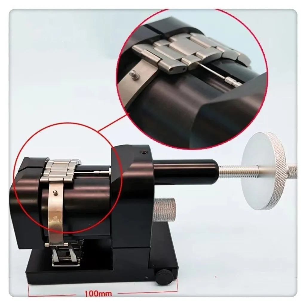 Alloy steel watch strap stripping machine tool set for watch repair on a workbench.
