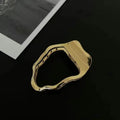 Women's zinc alloy hair barrette in gold or silver, showing square, triangle, and arc shape options.