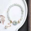 Natural emerald green jade peace buckle pearl bracelet for women with geometric design
