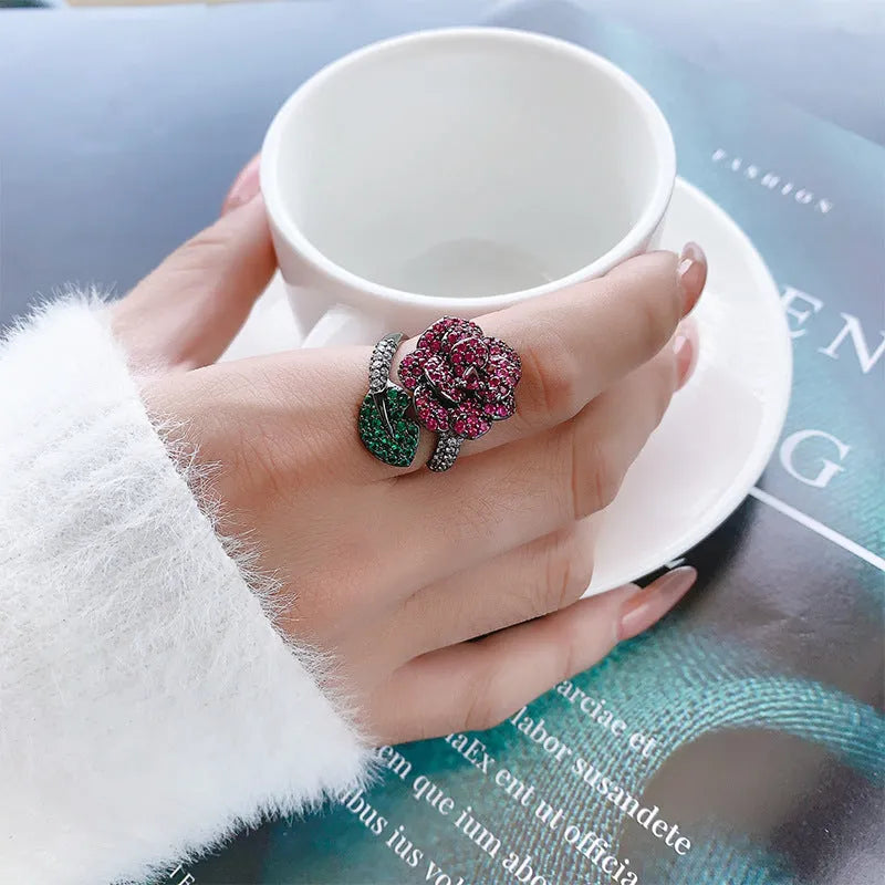 Black gold geometric floral women's ring with simulated red corundum stones