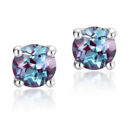 Simple geometric round ear studs in silver with a purple-green cultivate Alexandrite stone.