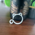 Plastic cat-shaped plant clip for gardening support in red, yellow, green, or white colours
