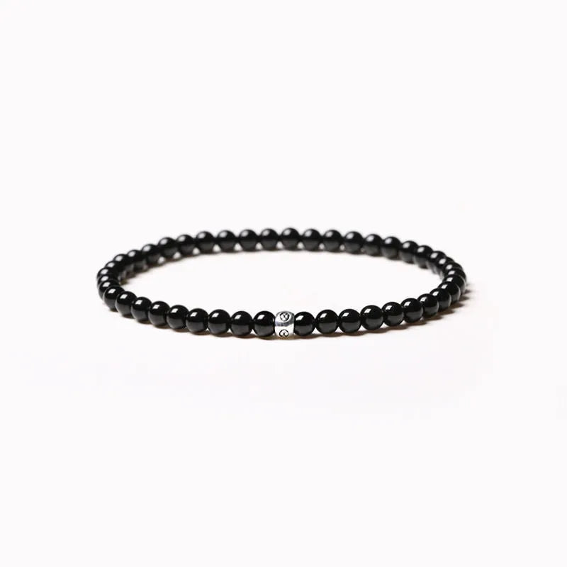 Geometric agate bracelet with obsidian, blue san and cut surface black agate beads