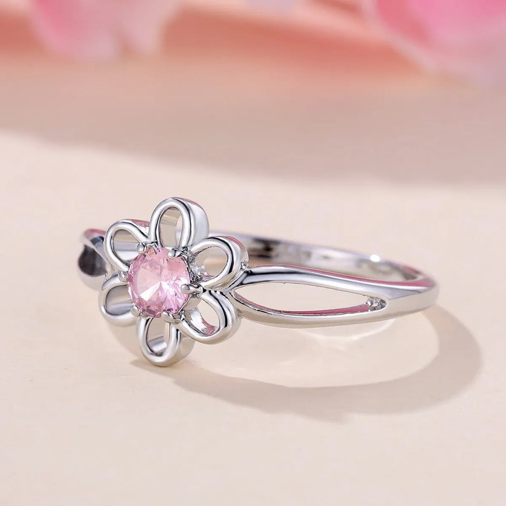 Women's copper ring with hollow floral design in electroplated platinum pink diamond colour