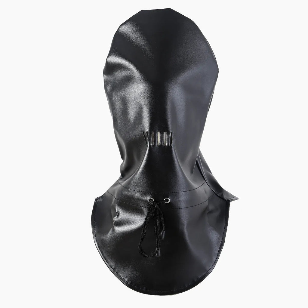 Black leather adult training mask headgear prop on a plain background