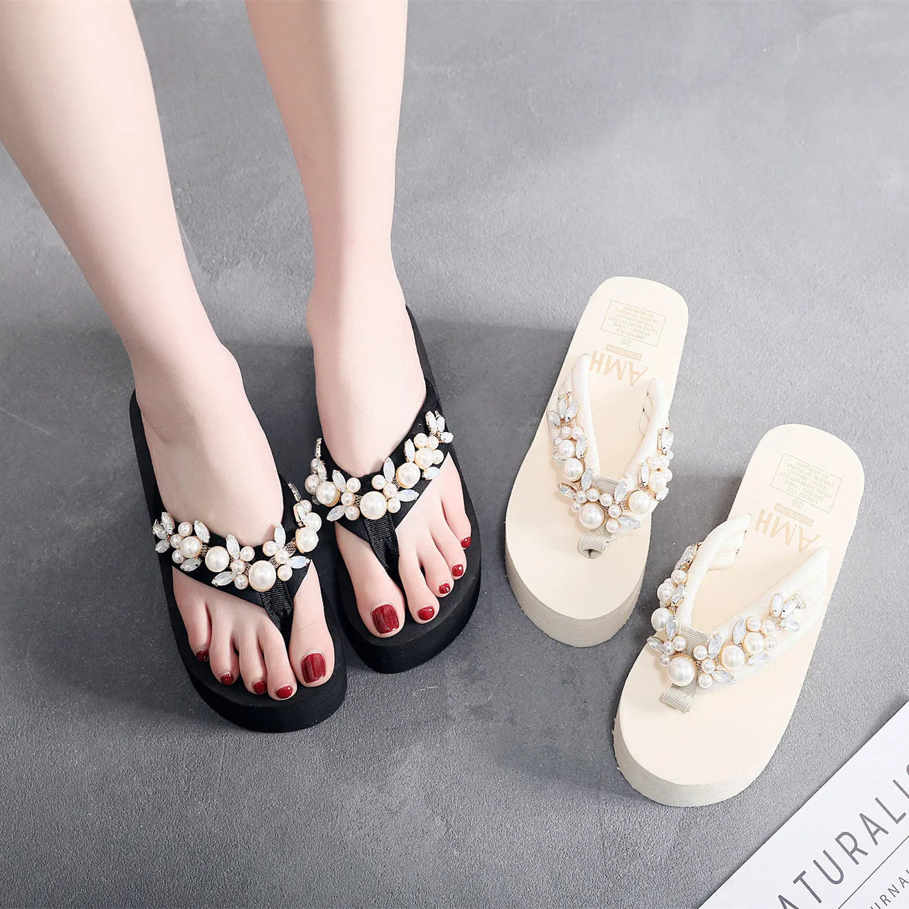 Women's beige high-heeled flip-flop with cotton cloth upper, shown from the side.