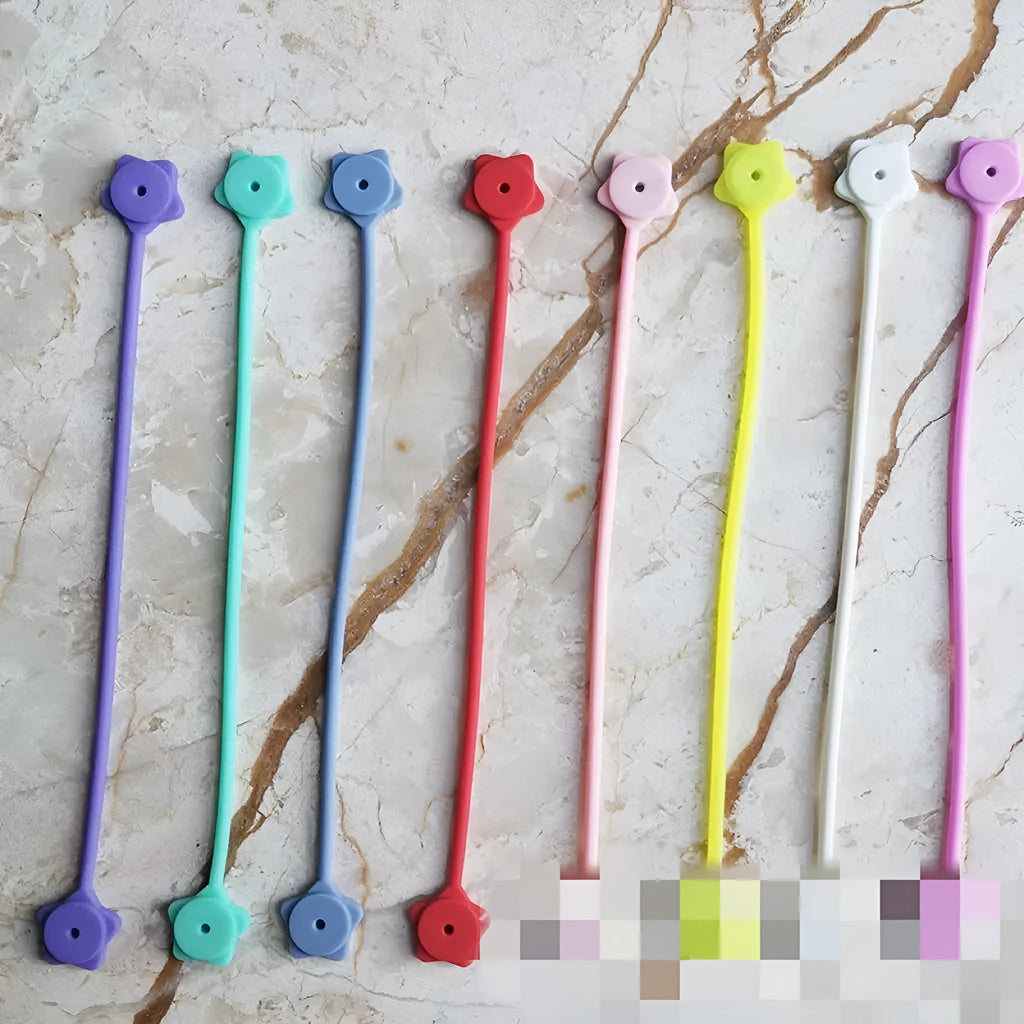 Silicone magnetic wire winder organiser for headphone and computer cables in multiple colours