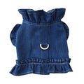 Blue denim dog dress with ruffles and built-in chest and back leash hooks on a small dog.