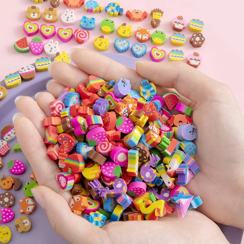 Pearlescent bag with 50 colourful TPR cartoon mini erasers, 1-1.5cm, showing fruit, animal, and themed shapes.