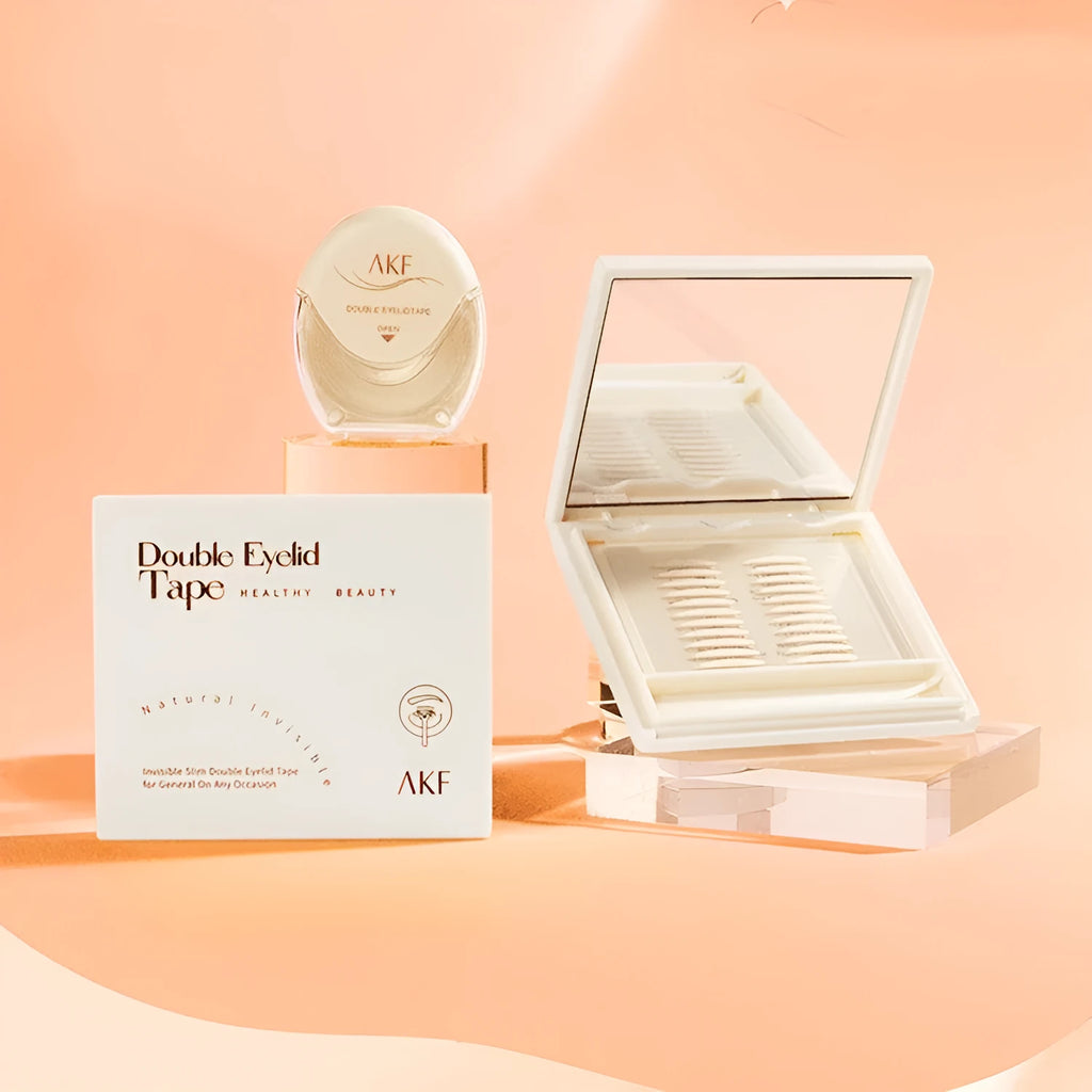 Roll of invisible lace double eyelid stickers in shades Crescent M, Crescent S, and Olive M.