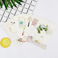 Set of nine minimalist cartoon postcards with retro Japanese-style illustrations of Paris landmarks.